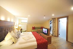 Raumansicht Doppelzimmer mit Zusatzbett Doppelzimmer mit Zusatzbett für 3-Personen-Belegung